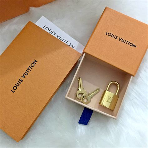 how to tell if louis vuitton padlock is real|louis vuitton lock it bag.